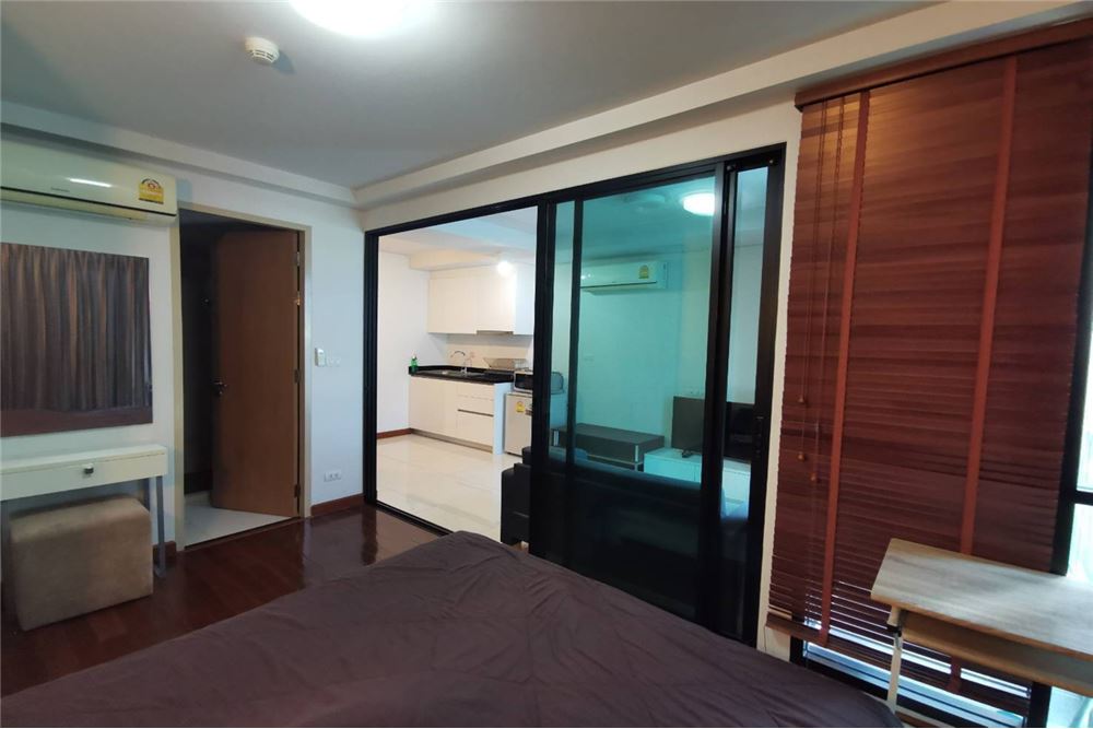 Hot deal   1 bedroom1 bathroom with sliding glass door dividing between a living room and bedroom is located in early Th
