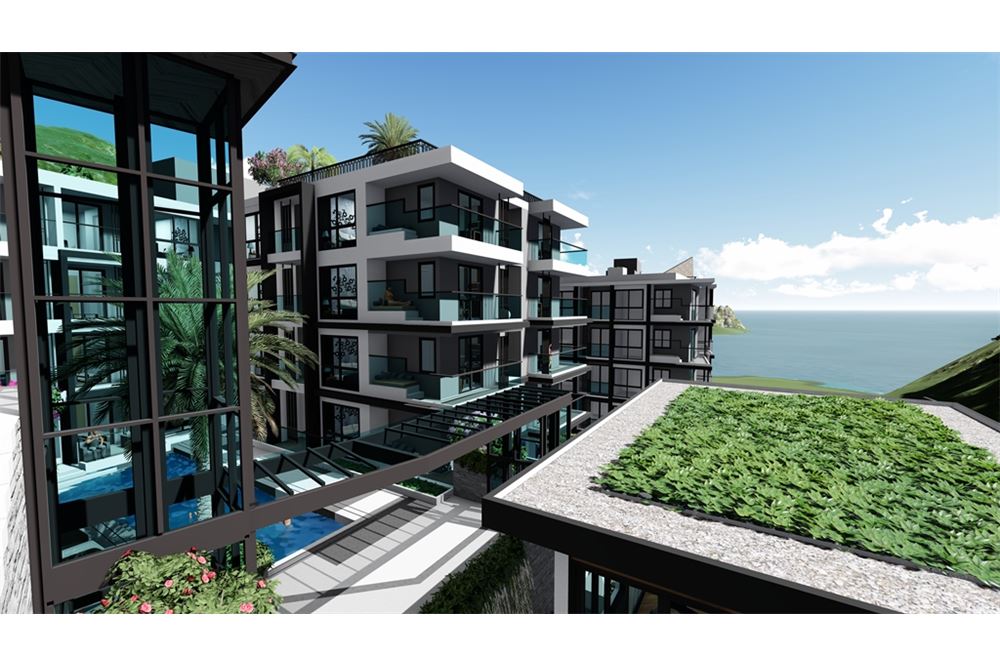 A new luxury condominium is under construction sea view walk distance from the beach promenade and all amenities Pre-sal
